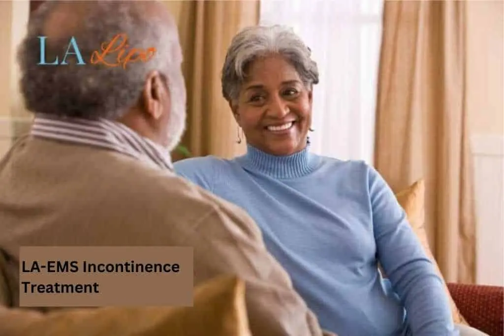 Couple sat smiling at each other - LA-EMS treatment Worcestershire