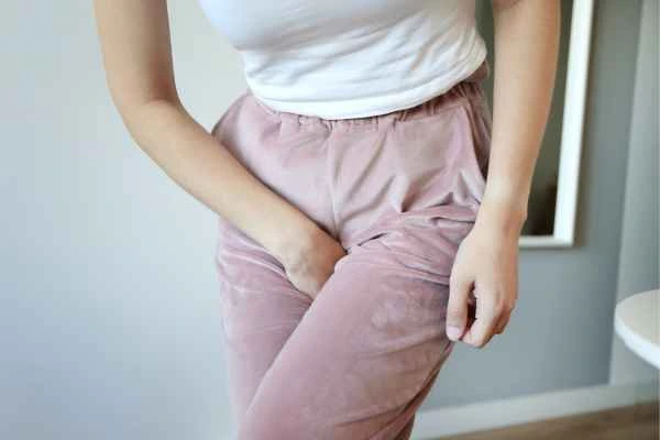 woman struggling with urine incontinence Worcestershire